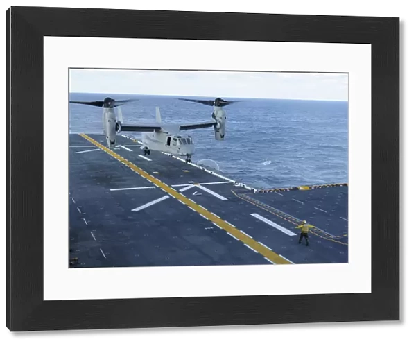 An MV-22 Osprey lands aboard the amphibious assault ship USS Iwo Jima