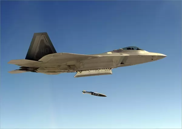 An F-22A Raptor drops a GBU-32 bomb
