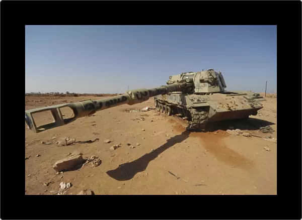 A M109 howitzer destroyed by NATO forces in the desert outside Benghazi, Libya