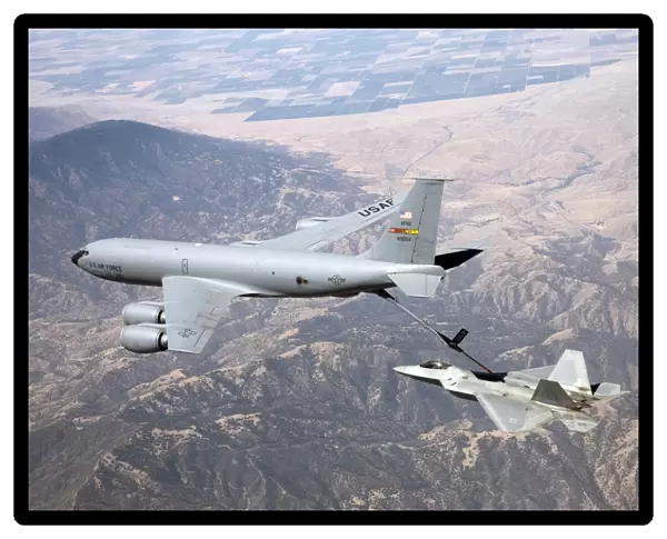 An F-22 Raptor receives fuel from a KC-135 Stratotanker