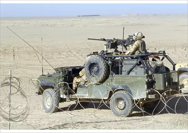 Gurkhas patrol Afghanistan in a Land Rover