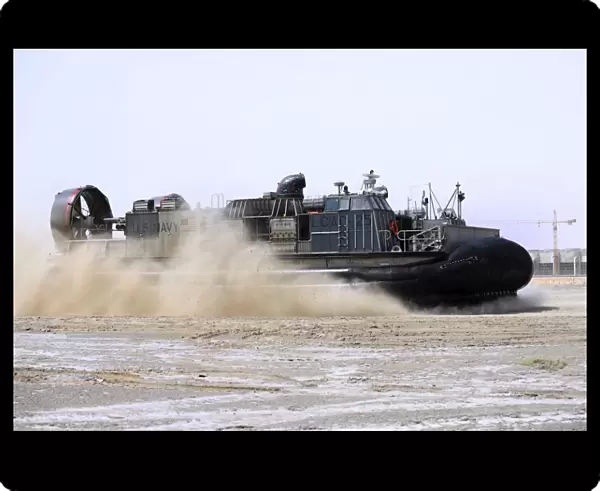 An air-cushion landing craft approaches the shore of Camp Al-Galail, Qatar