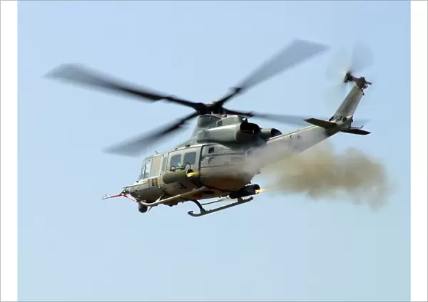 H-1 Upgrades Test Pilot, launches a pair of 2. 75 inch rockets from UH-1Y