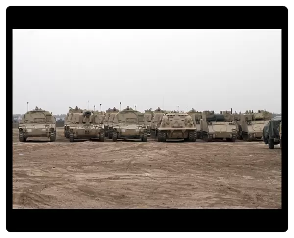 A selection of M992 C. A. T or Carrier Ammunition Tracked vehicles line up during a