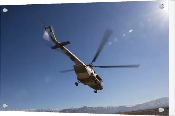 An Afghan Air Force Mil Mi-17 helicopter over Afghanistan
