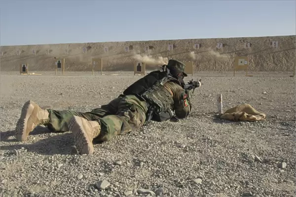 An Afghan Commando engages training targets on the firing range