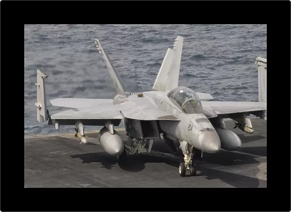 An F  /  A-18F Super Hornet is ready for a mission over Iraq