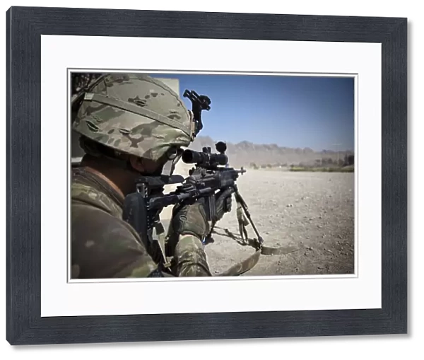 U. S. Army sniper pulls security using an Mk14 Enhanced Battle Rifle