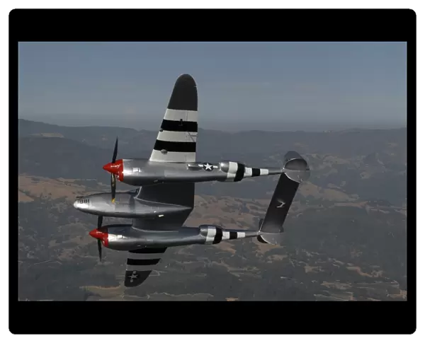 A P-38 Lightning in flight over Santa Rosa, California
