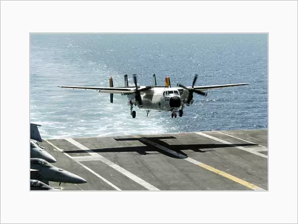 A C-2A Greyhound prepares to land on the flight deck of USS Dwight D. Eisenhower
