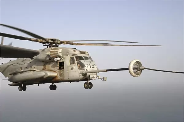 A U. S. Marine Corps CH-53E Super Stallion refueling over the Horn of Africa