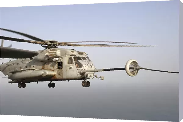 A U. S. Marine Corps CH-53E Super Stallion refueling over the Horn of Africa