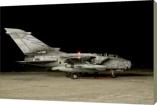 A Panavia Tornado ECR of the Italian Air Force prepares for a night mission