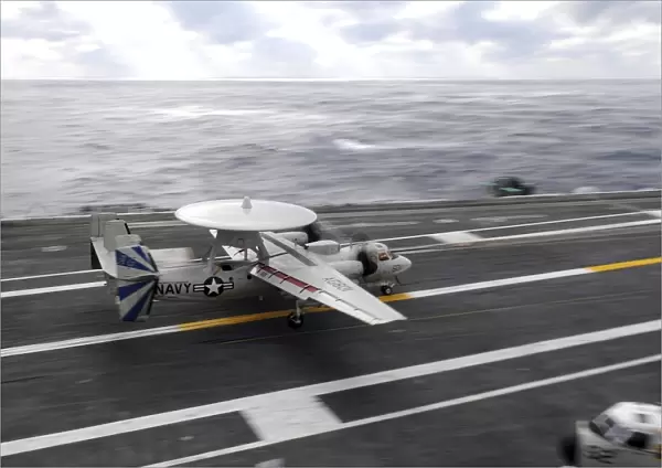 An E-2C Hawkeye conducts a touch-and-go landing aboard USS Dwight D. Eisenhower