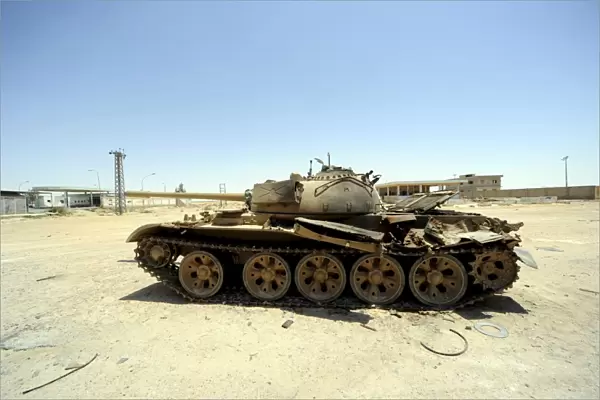 A T-55 tank destroyed by NATO forces in the desert north of Ajadabiya, Libya