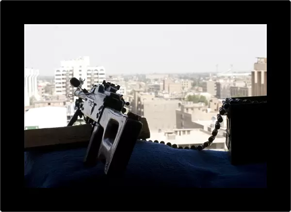 A PK 7. 62mm machine gun nest on top of the Baghdad Hotel during Operation Iraqi Freedom
