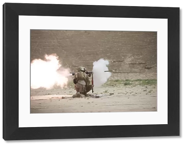U. S. Marines fire a RPG-7 grenade launcher