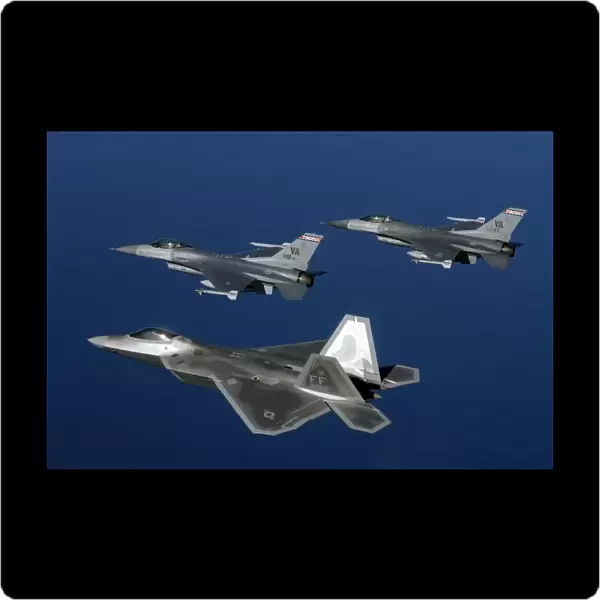 Three F-22A Raptor aircrafts fly in formation