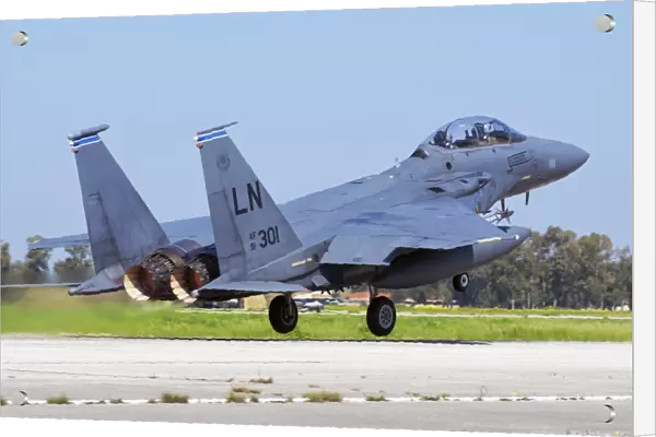 A U. S. Air Forces in Europe F-15E Strike Eagle taking off from Andravida, Greece