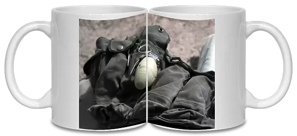 A plastic body fragmentation hand grenade