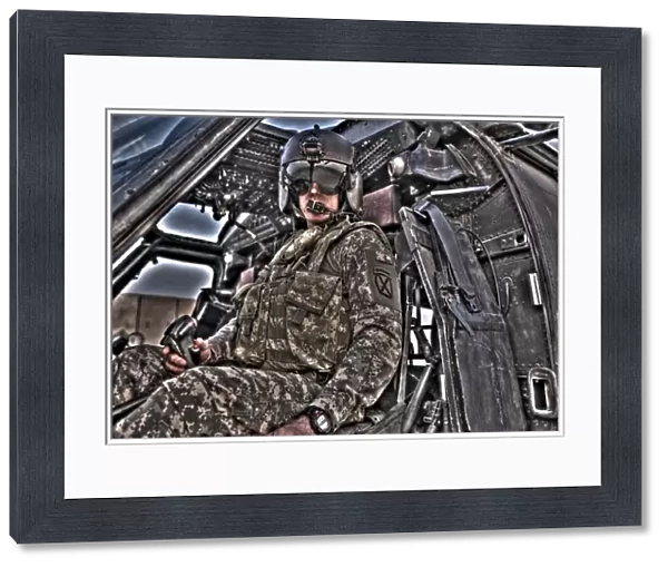 HDR image of a pilot sitting in the cockpit of a UH-60 Black Hawk