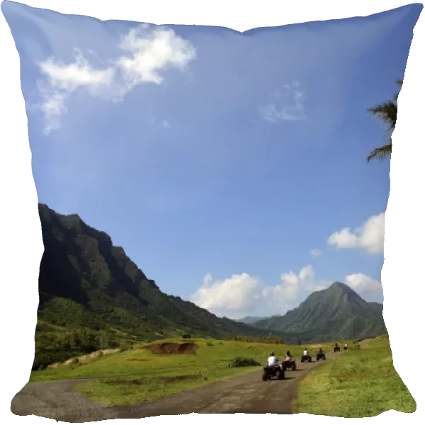 A group of ATV quad riders take to the trail near Ko olau Range in Oahu, Hawaii