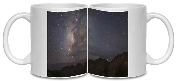 Diffuse starlight and dark nebula over Mount Balang in China