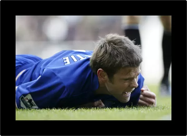 Everton's James Beattie in Action: On the Pitch Intensity