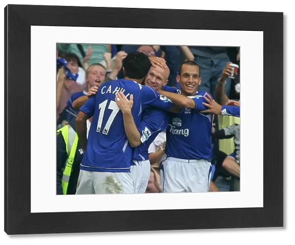 Everton's Unforgettable Moment: Johnson, Cahill, and Osman Celebrate First Goal