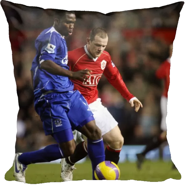 Manchester United v Everton Joseph Yobo Everton in action against Wayne Rooney
