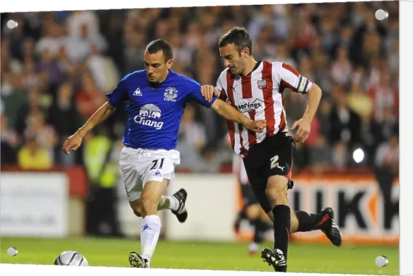 Osman vs. O'Connor: A Football Rivalry Ignites in Everton's Carling Cup Showdown at Griffin Park