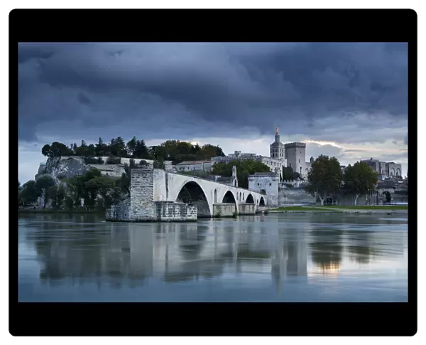 The Pont St-Benezet, Palais des Papes and Rhone River at dusk, Avignon, Provence