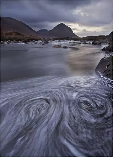 Eddies in the River Sligachan with Marsco in background. Isle of Skye, Scotland, UK