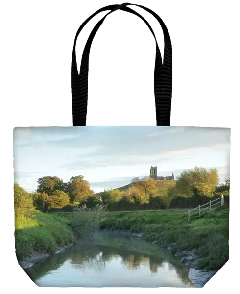 Landscape with river Parrett in foreground and Burrow Mump in background, with ruined church