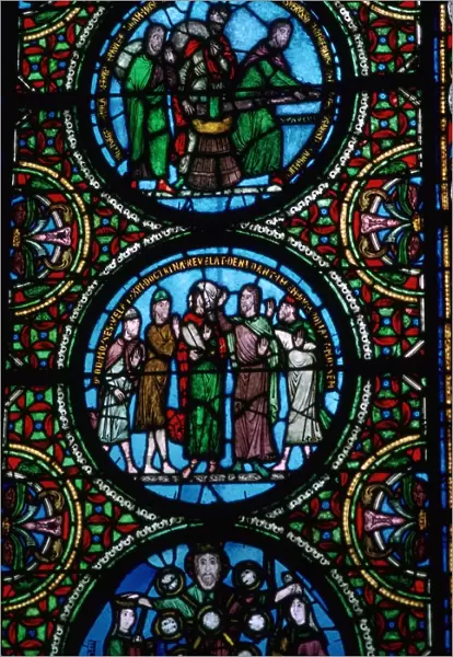 Detail of a stained glass window in St Denis, France, 12th century