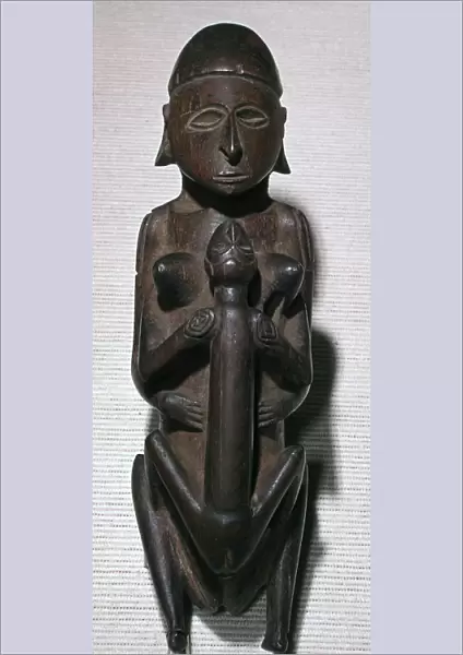 Figure of copulating man and woman from the Torres Straits islands
