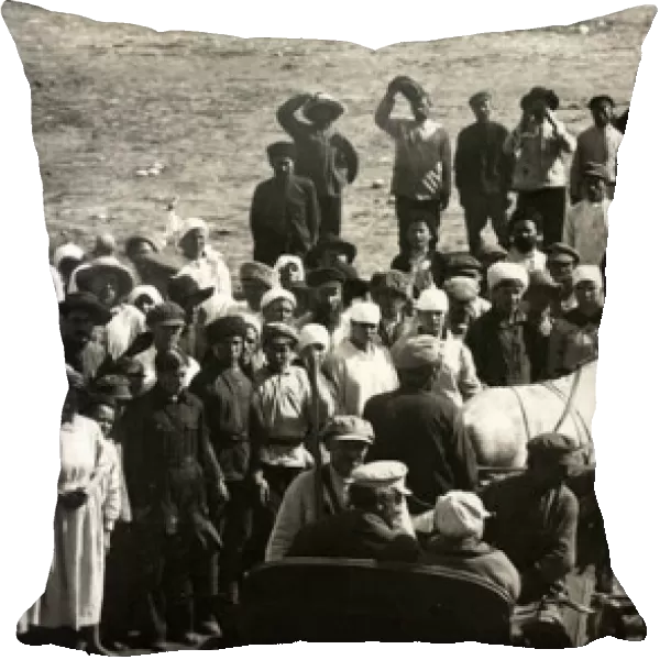 Leon Trotsky underway at a village, 1924