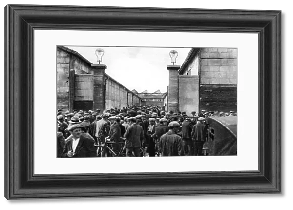 Workers at the entrance of a Billancourt factory, Paris, 1931. Artist: Ernest Flammarion