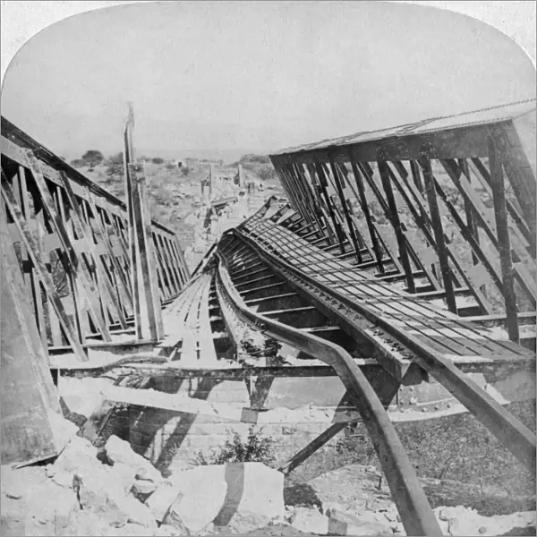 Railway bridge across the Vals River at Kroonstad, blown up by the Boers, South Africa, 1901. Artist: Underwood & Underwood