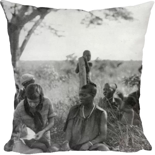Stella Court Treatt tending a sick baby, Bulawayo to Dett, Southern Rhodesia, c1924-c1925 (1927). Artist: Thomas A Glover