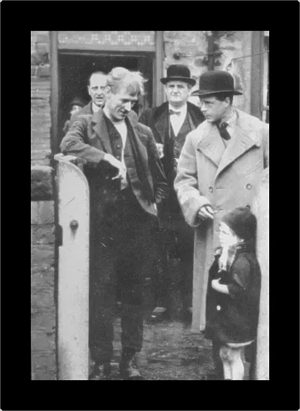 The Prince of Wales visiting a miners cottage in the Northeast of England, 1929 (1936)