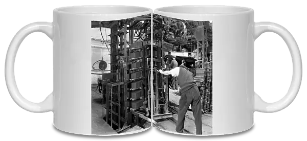 Loading a palletising machine with bricks, Whitwick Brickworks, Coalville, Leicestershire, 1963