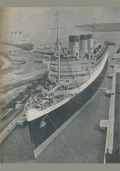 Arrival of RMS Cunard White Star liner Queen Mary in King George V Graving Dock, 1936