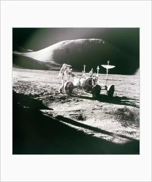 Astronaut with Lunar Roving Vehicle on the Moon, 1970s. Creator: NASA