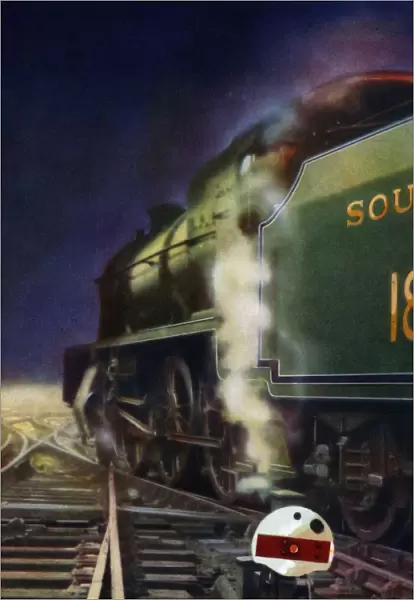 The Night Journey. A mixed-traffic locomotive of the Southern Railway at a cross-over, 1935