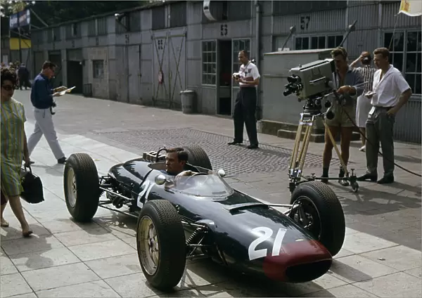 Lola Coventry Climax, Chris Amon being filmed 1963 German grand Prix. Creator: Unknown