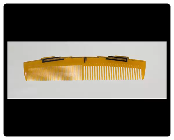 Bakelite comb from dresser set owned by Lena Horne, mid 20th Century. Creator: Agalin