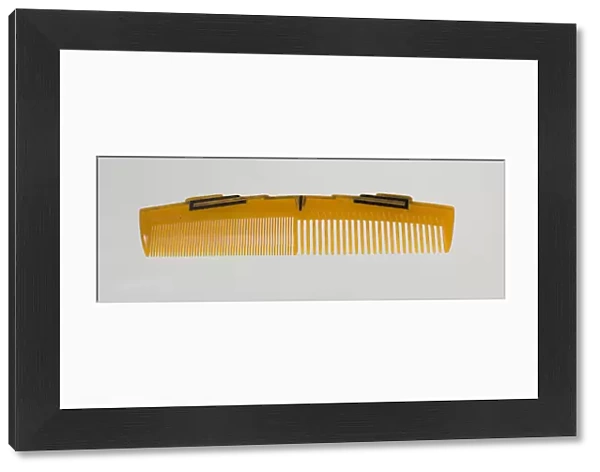 Bakelite comb from dresser set owned by Lena Horne, mid 20th Century. Creator: Agalin