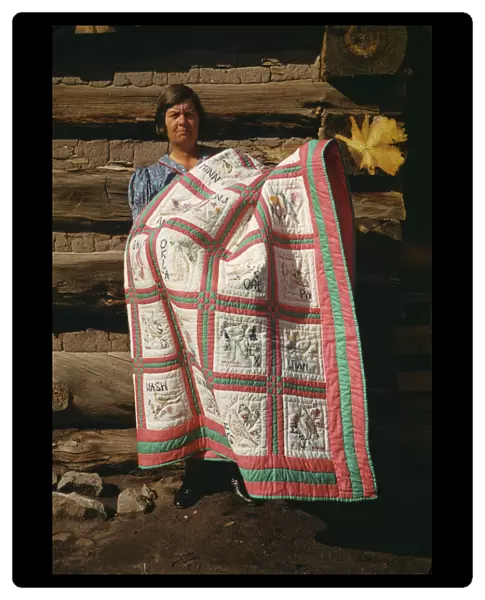 Mrs. Bill Stagg with state quilt, Pie Town, New Mexico, 1940. Creator: Russell Lee