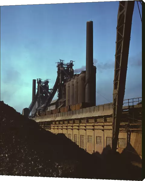Blast furnaces and iron ore at the Carnegie-Illinois Steel Corporation mills, Etna, Pennsylvania, 19 Creator: Alfred T Palmer
